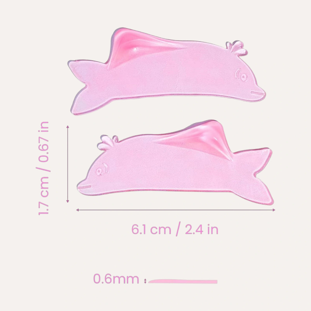 LOMANSA pink dolphin-shaped lash lift pads with dimensions: 6.1 cm long, 1.7 cm high and 0.6 mm thick.