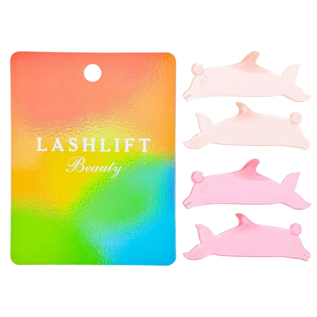 LOMANSA dolphin-shaped lash lift pads in two shades of pink, four pieces beside rainbow packaging.