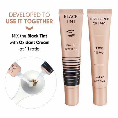 LOMANSA black eyelash and eyebrow tint mixed 1:1 with developer cream in a mixing spoon