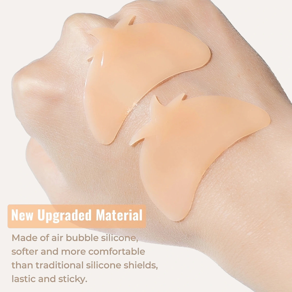 LOMANSA nude silicone lash lift shields displayed on the back of a hand.