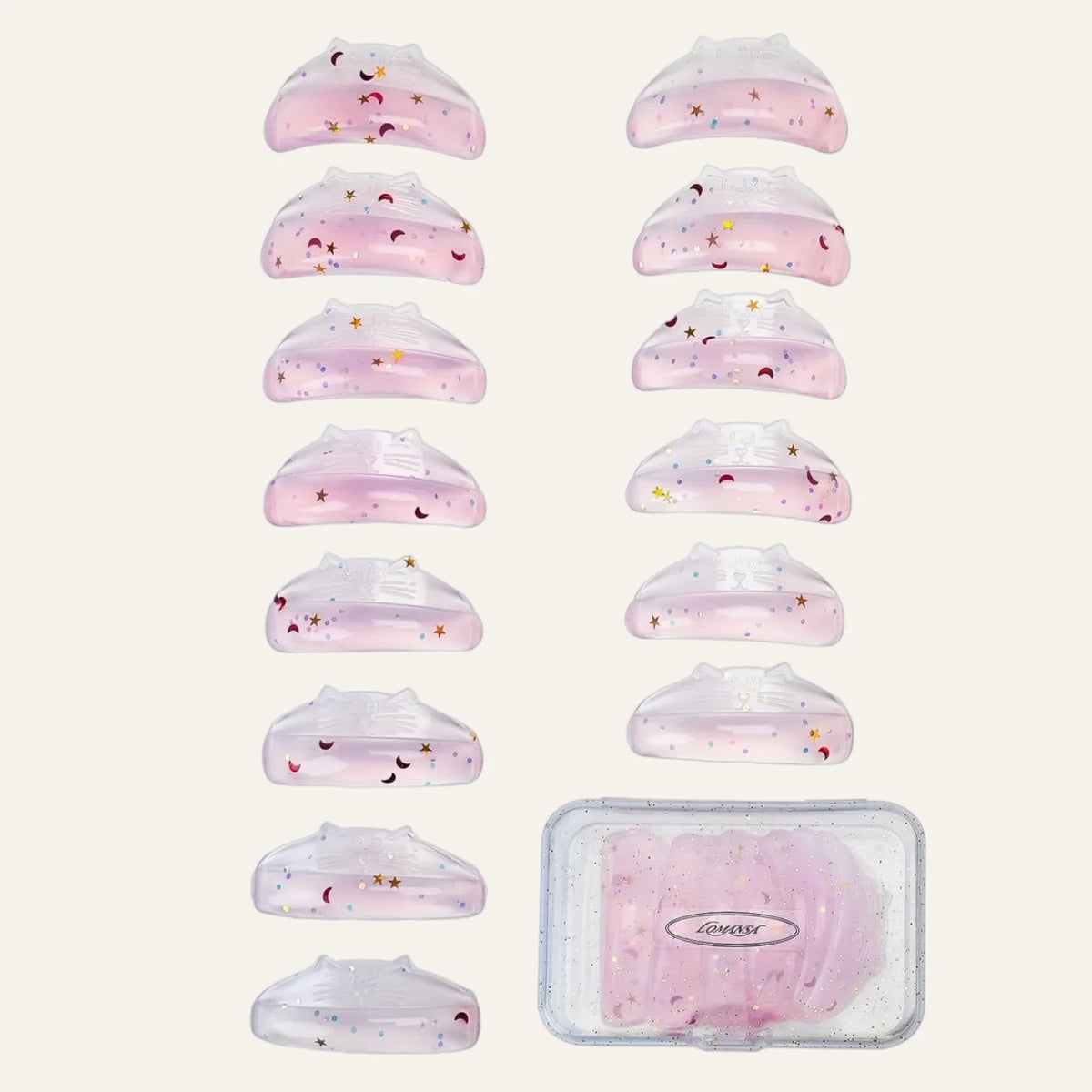 LOMANSA pink glitter lash lift pads in 7 size pairs with a clear storage case for organized salon use.