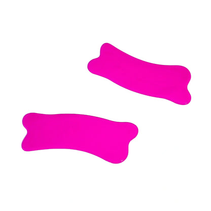 Pair of bright pink under-eye pads with curved edges on a white background.
