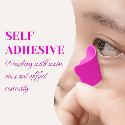 Close-up of a pink under-eye pad being applied, with text stating self-adhesion remains after washing.