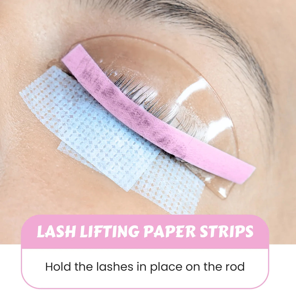 Lomansa pink lash lift paper strip holding eyelashes in place on a curved lash shield during treatment.