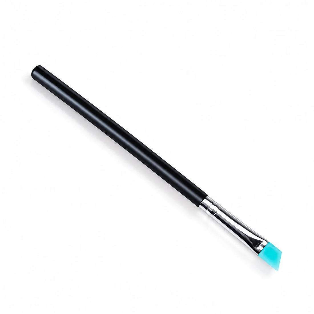 Lomansa turquoise-tipped angled silicone applicator brush laid diagonally with the silicone tip facing right.