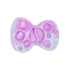 LOMANSA pink marble butterfly-shaped lash lift lotion palette with recessed wells and a brush rest.