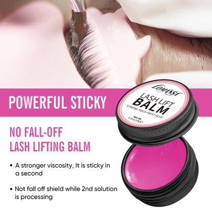 LOMANSA hot pink fragrance lash lift balm with brush and close-up lashes secured on a silicone shield.